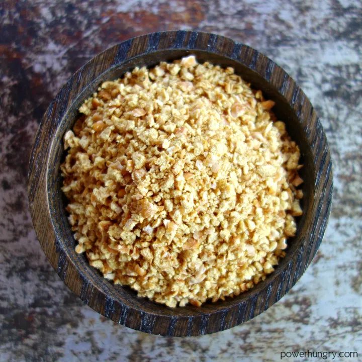 chickpea breadcrumbs in a dark wood bowl