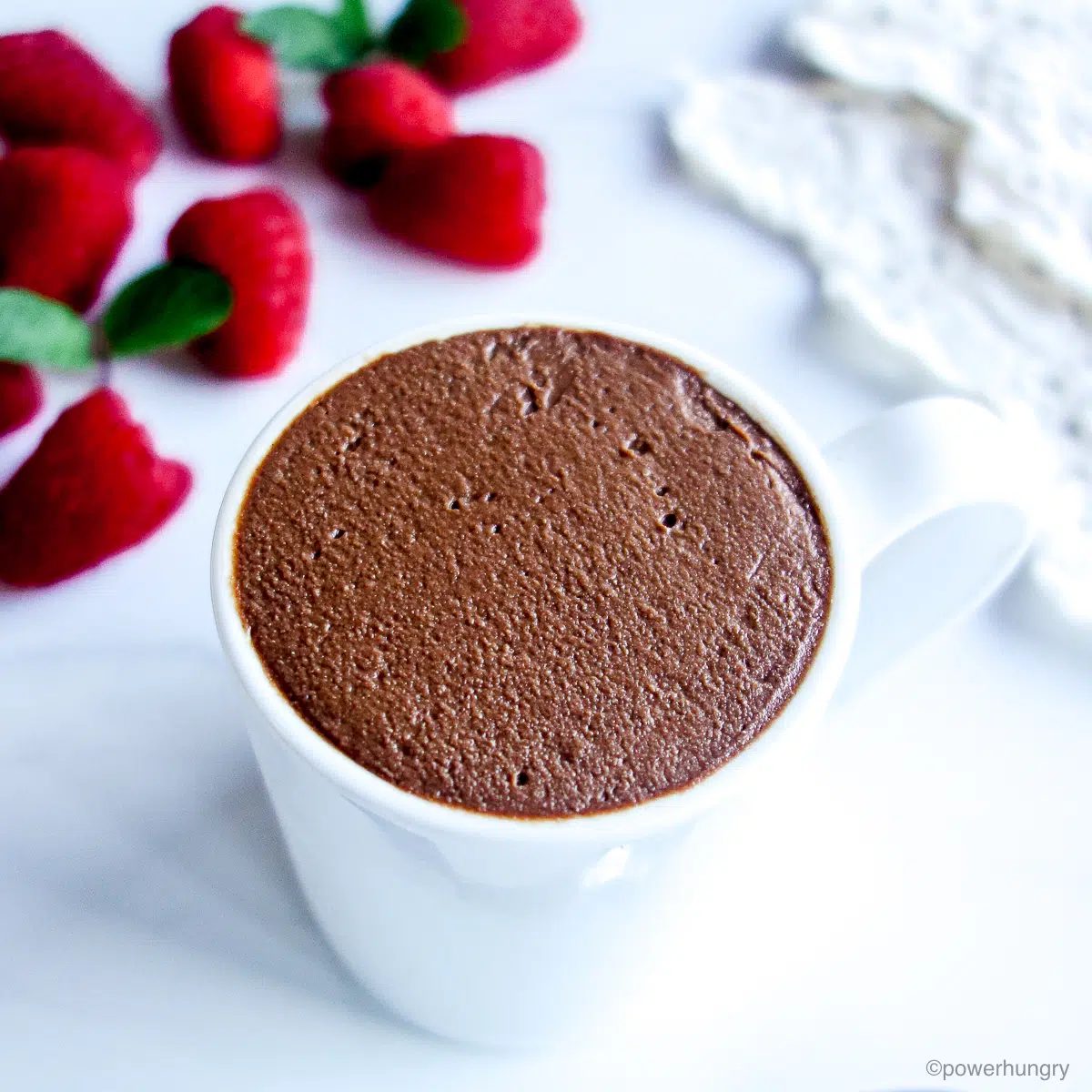 chocolate mousse in a white cup