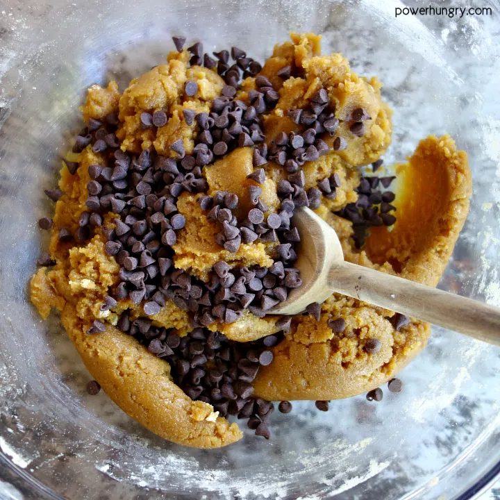 Glass bowl of chickpea flour chocolate chip cookie dough