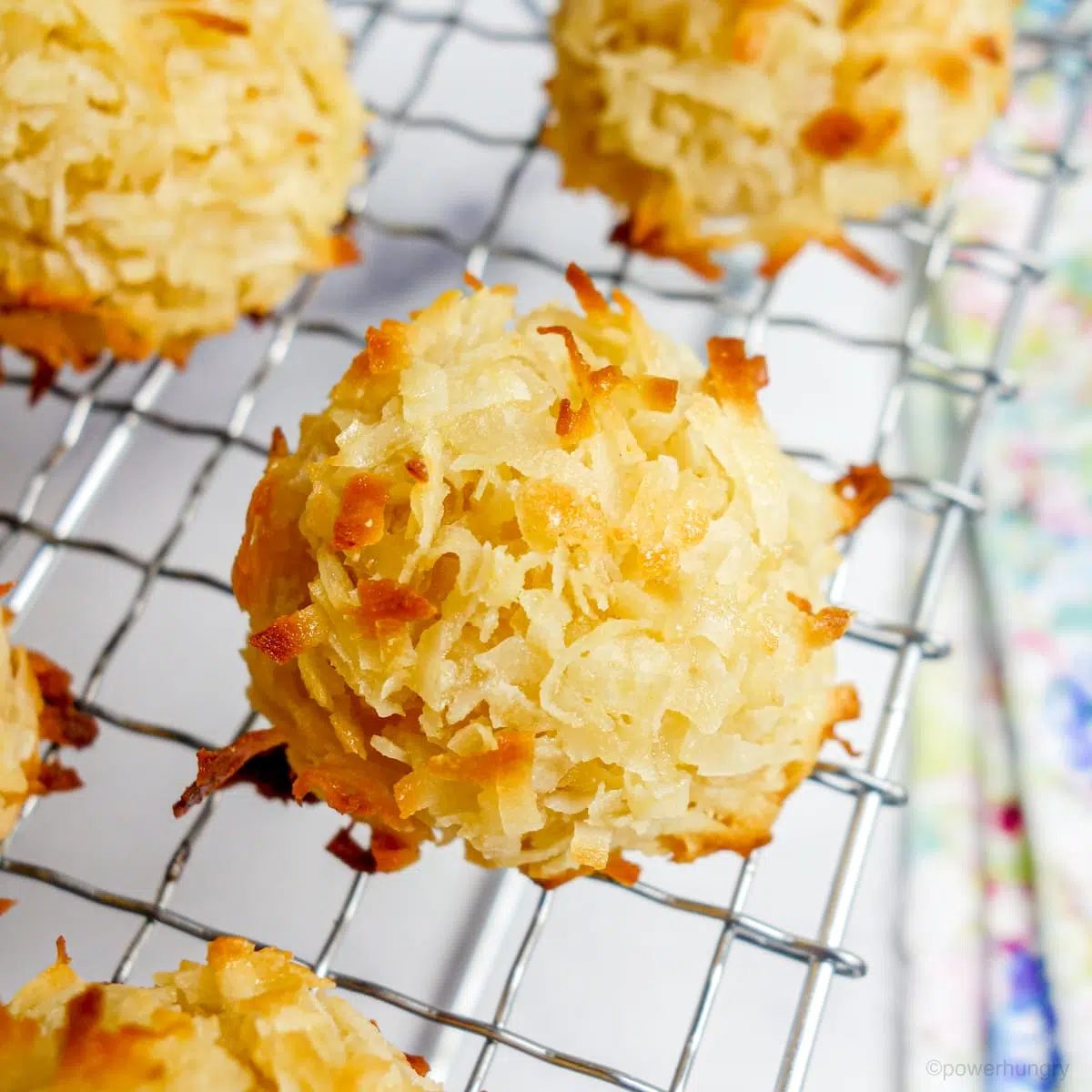 chickpea flour coconut macaroons on a cooling rack