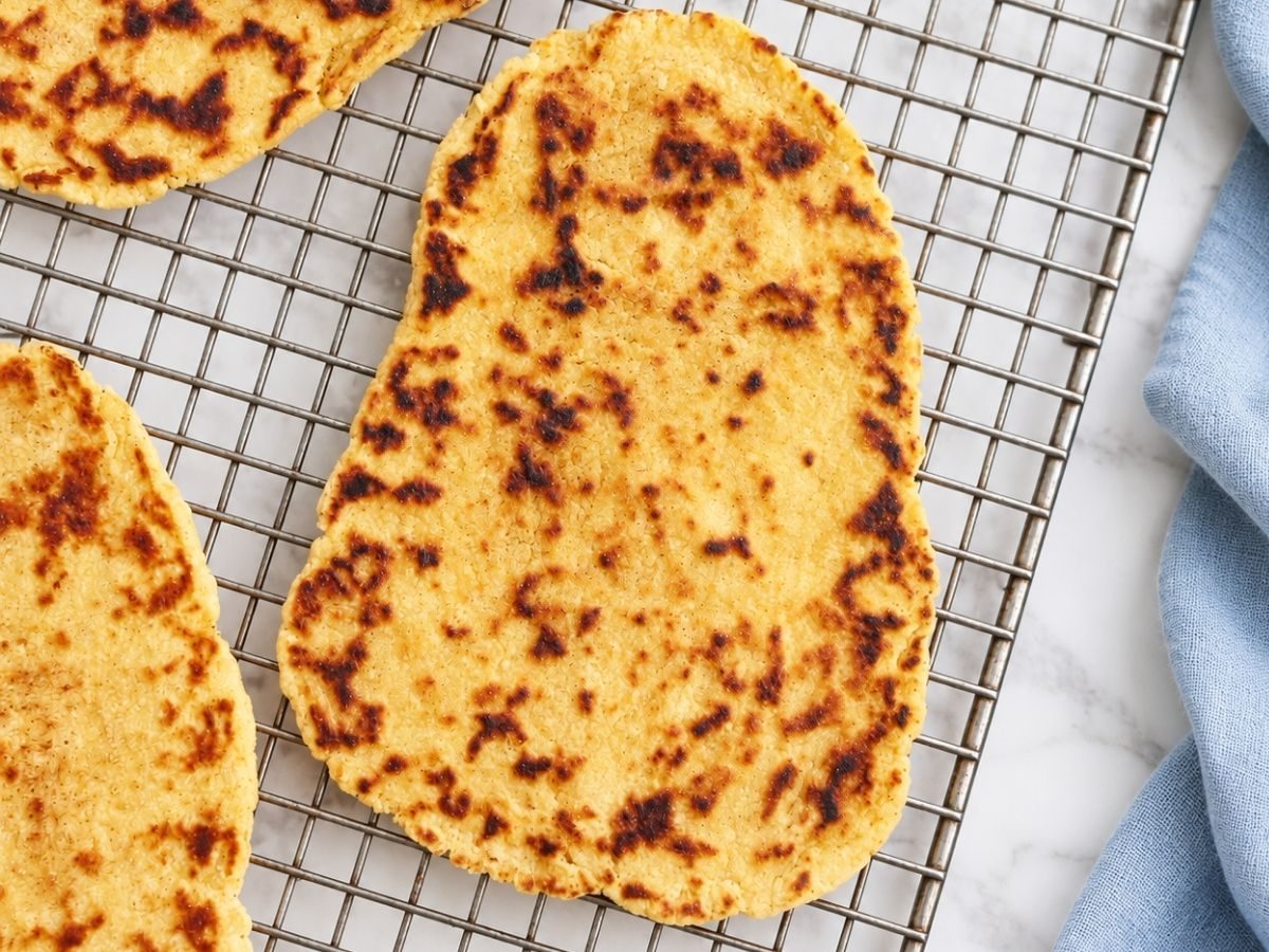 chickpea flour naan on a cooling rack