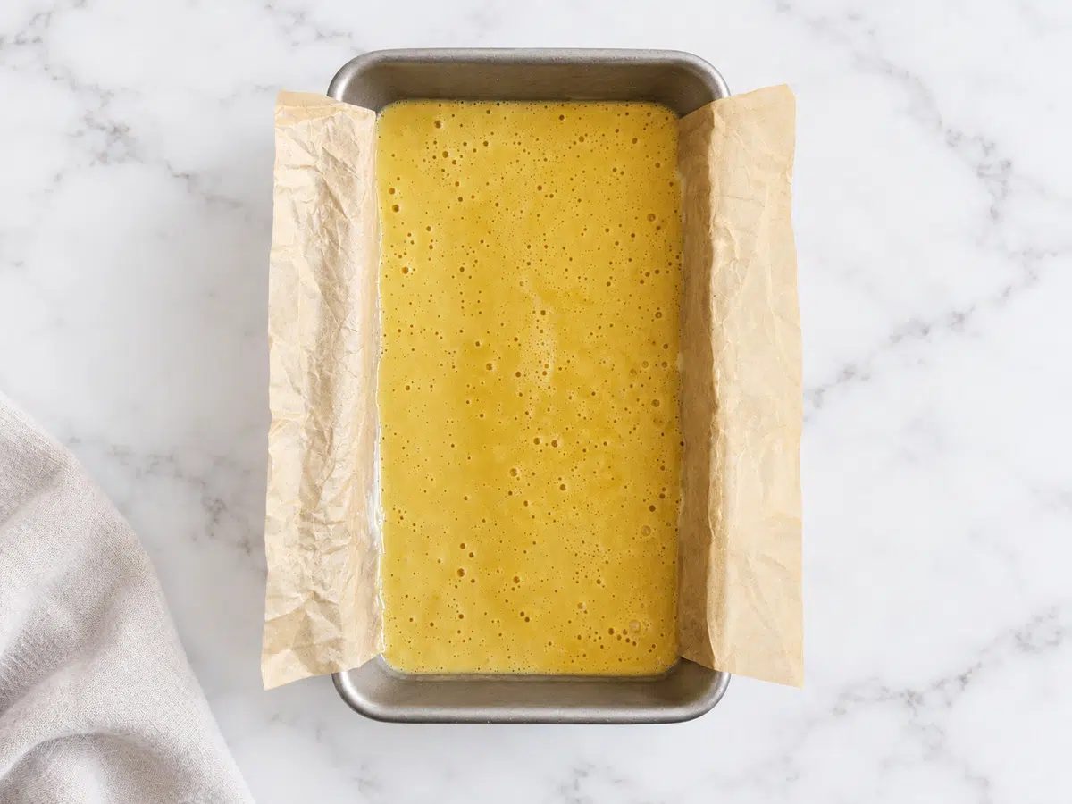 batter in loaf pan for chickpea flour bread