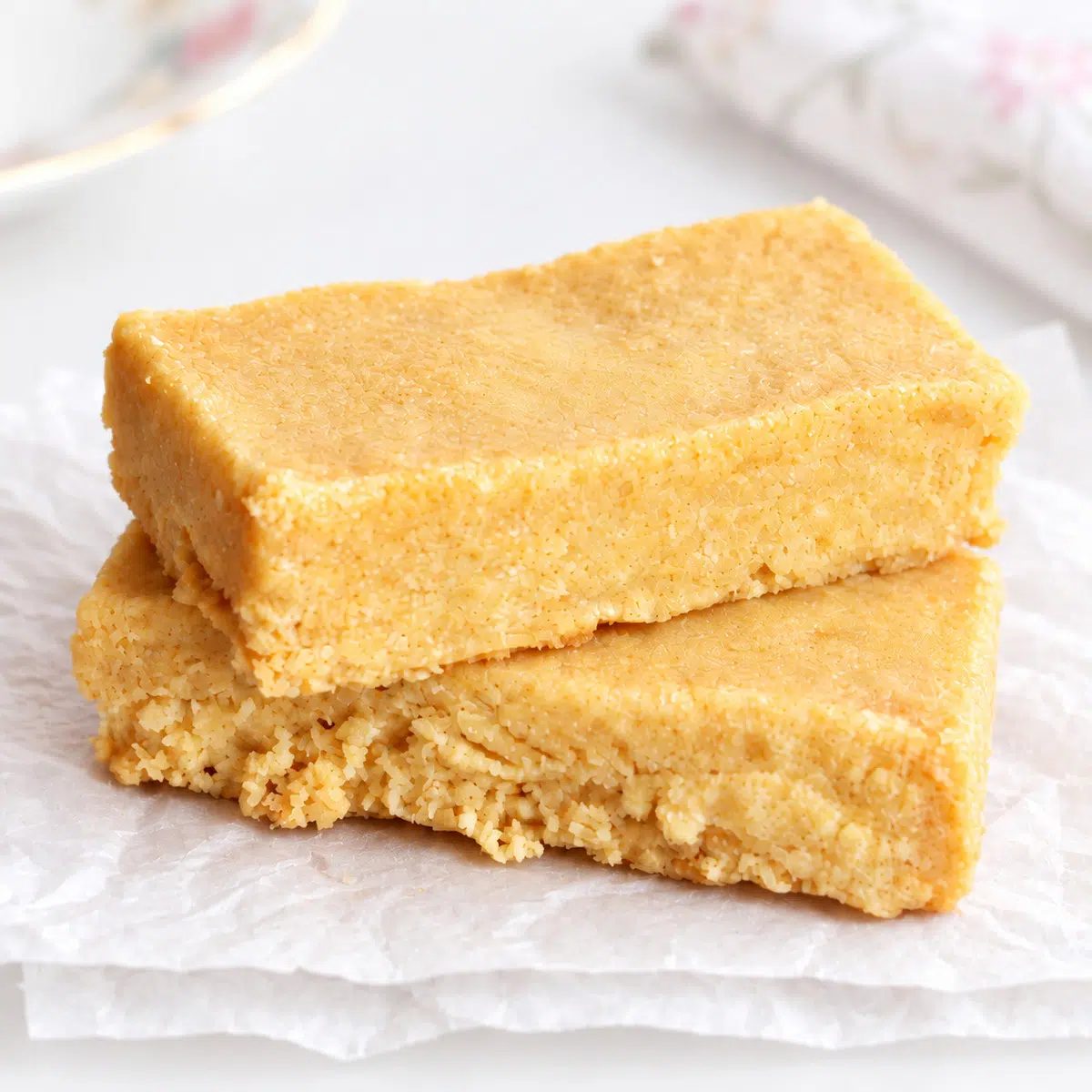 two cookie stack of chickpea flour shortbread cookies, and tea