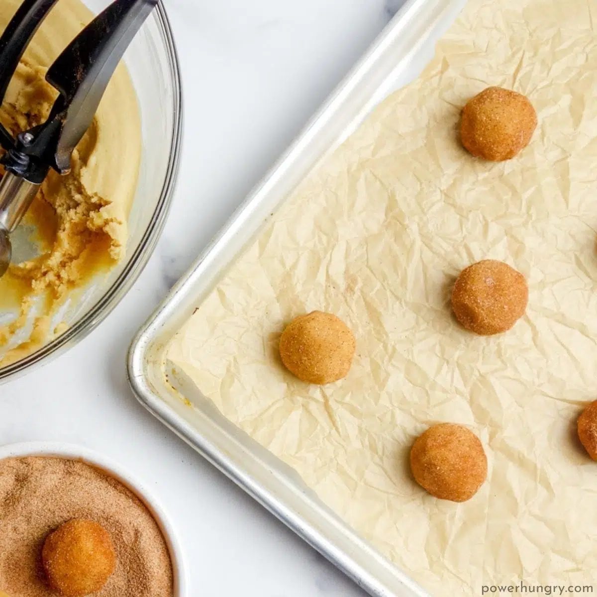vegan cookie balls on a baking sheet