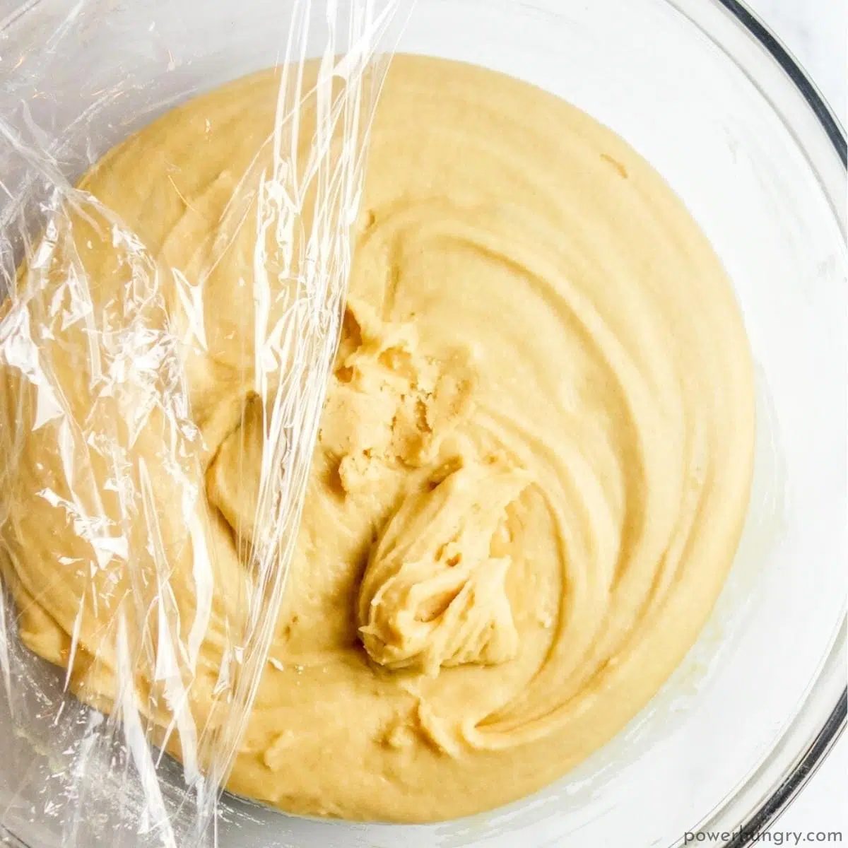vegan chickpea flour cookie dough in a glass bowl