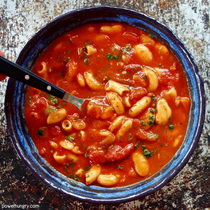 Bowl of chickpea pasta e fagioli soup that is vegan, grain-free, and high in protein