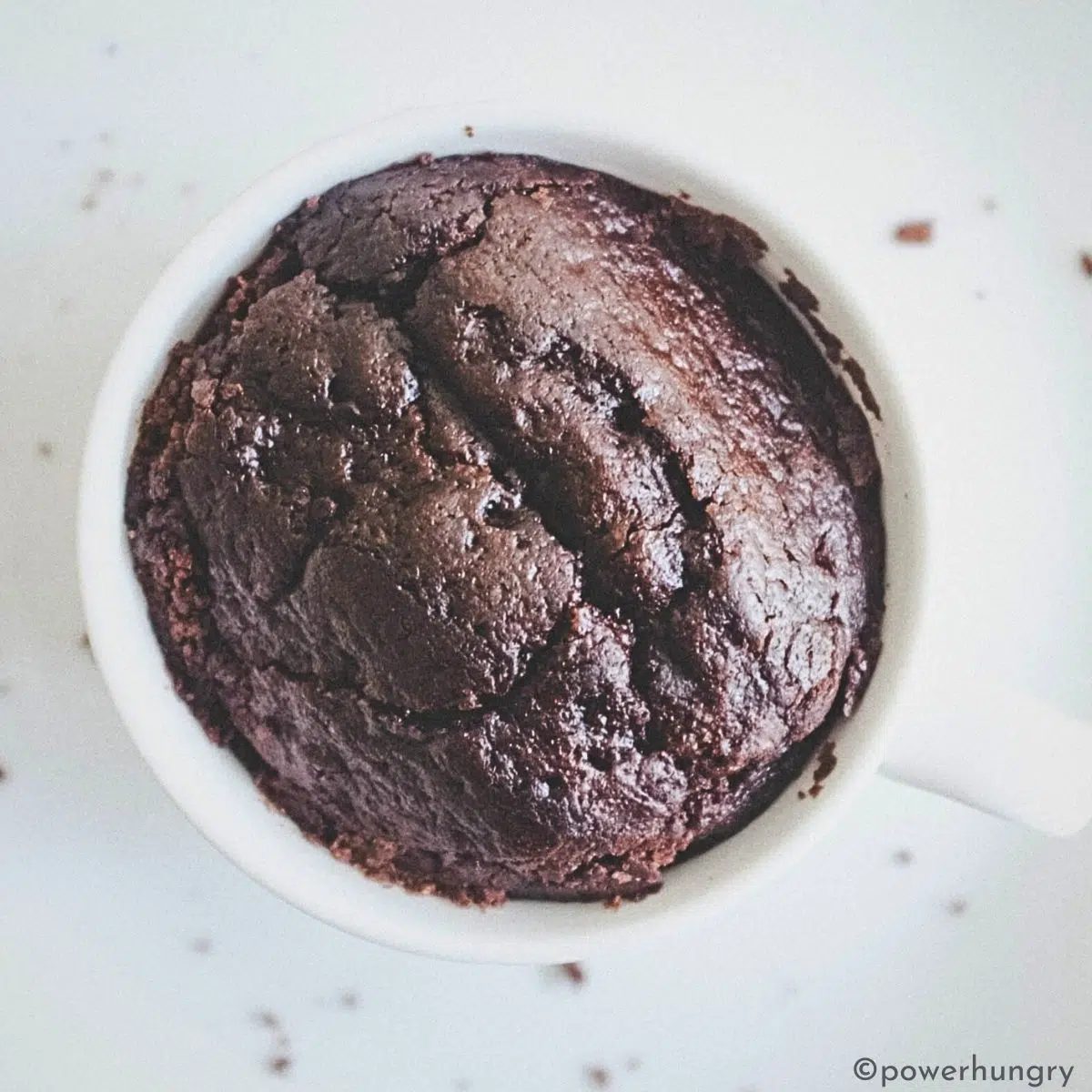 vegan almond flour chocolate mug cake in a white mug