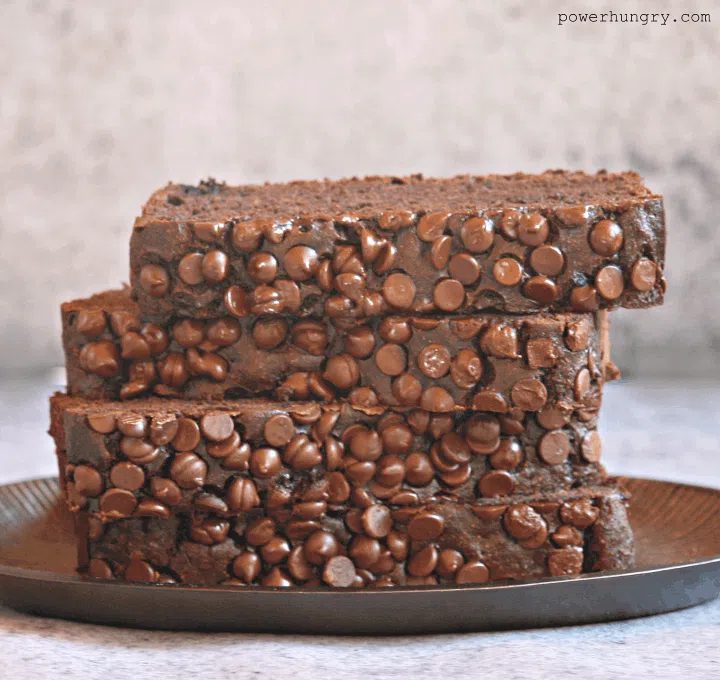 stack of 4 slices of chocolate chickpea banana bread on a metal plate
