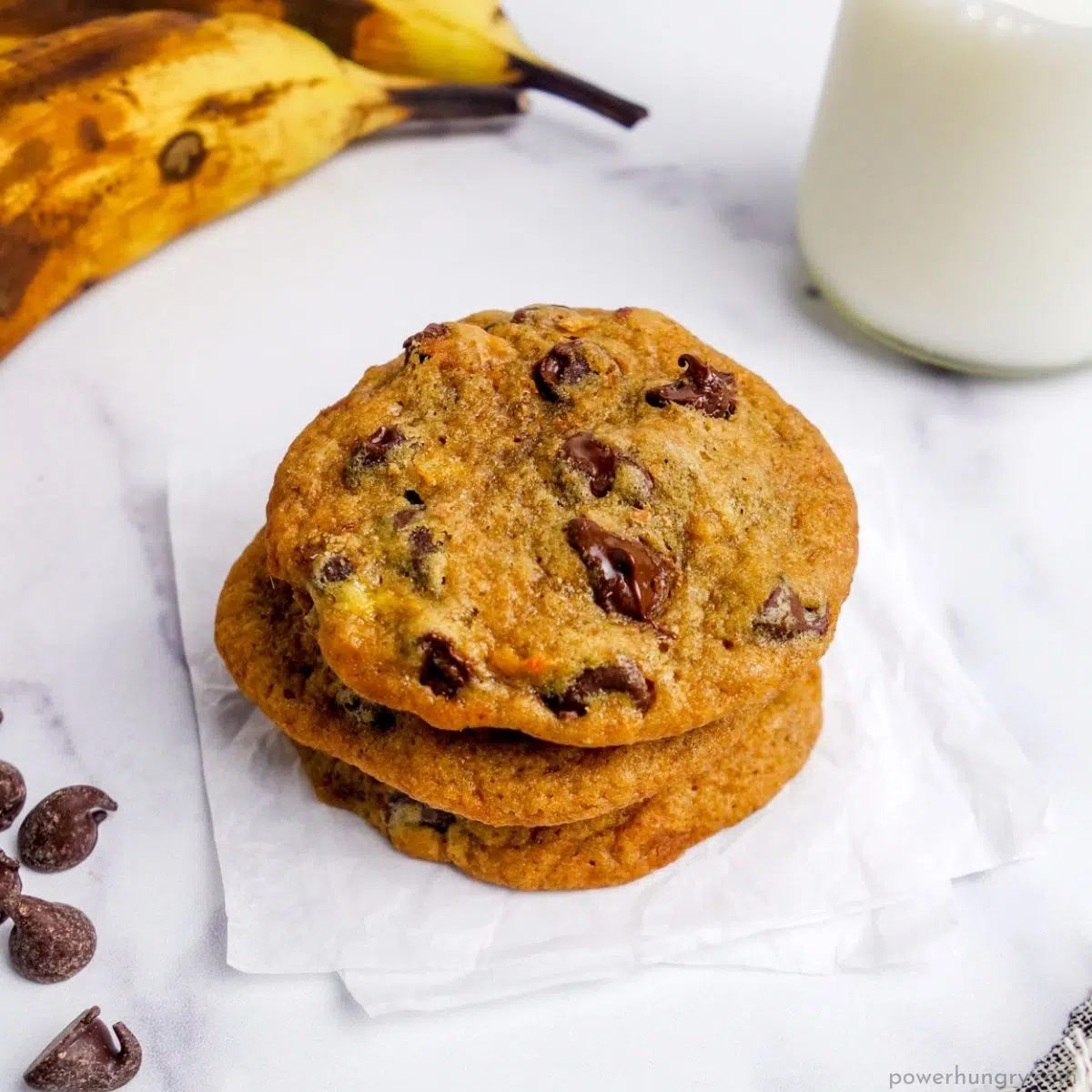 a stack of banana chocolate chip cookies