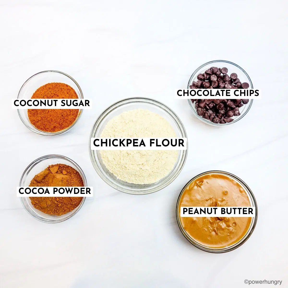 ingredients for chocolate peanut butter chickpea flour cookies, all in glass bowls