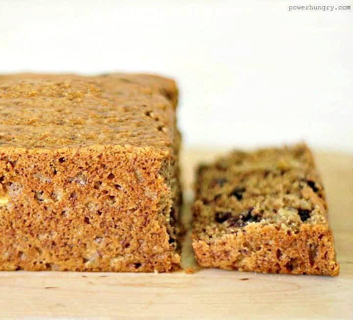 side view of cinnamon almond bread, sliced, on a cutting board