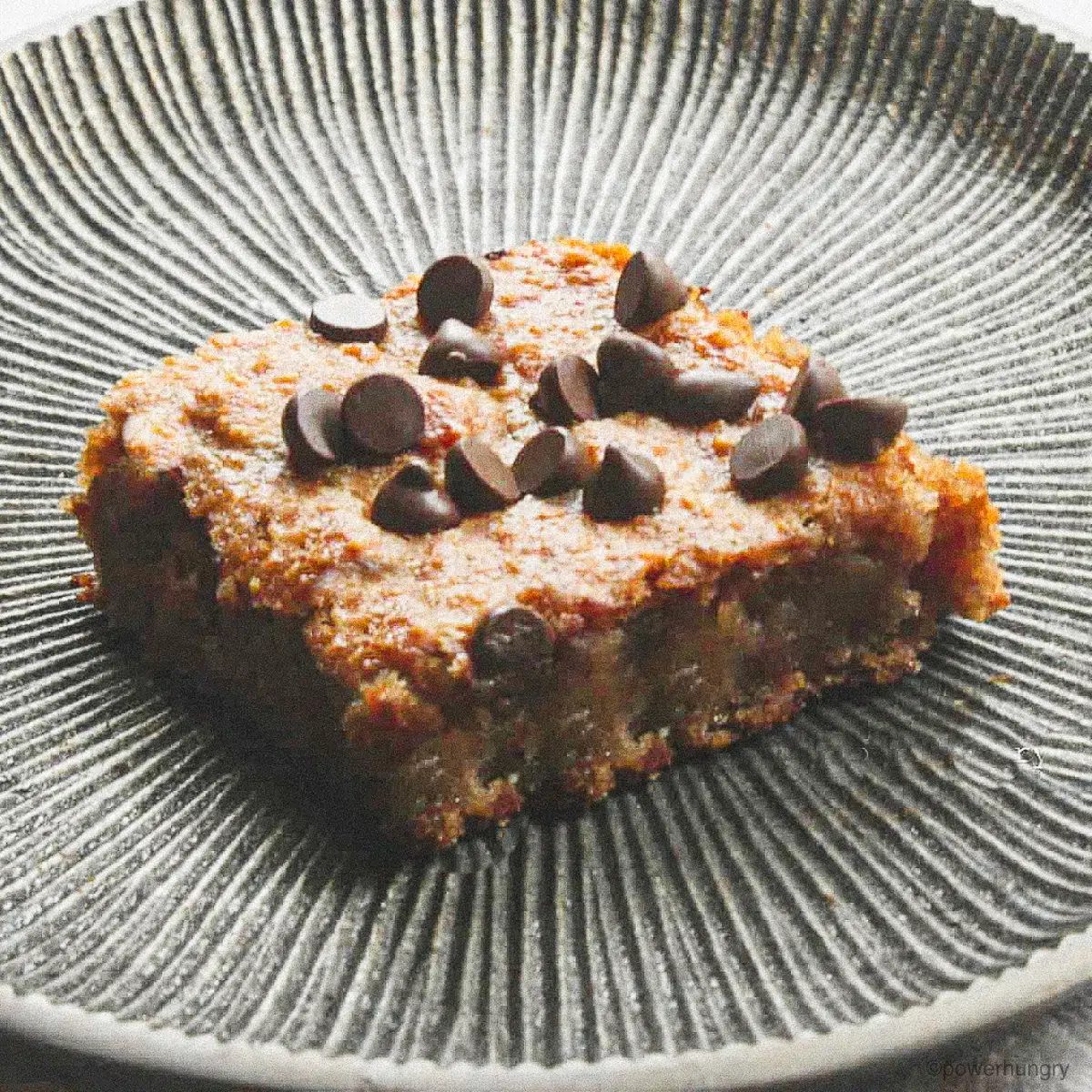 single vegan coconut flour blondie on a metal plate