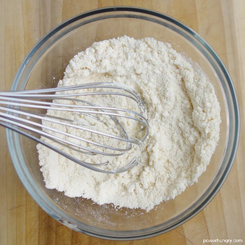 coconut flour and baking soda mixed in a glass bowl