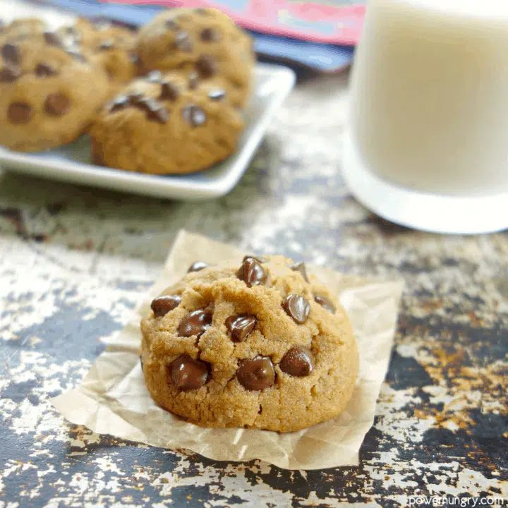close-up of a vegan keto coconut flour cookie on a piece of parchment paper