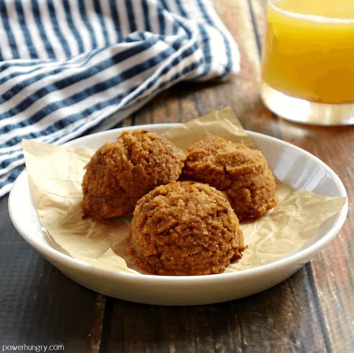 three coconut flour lentil cookies on a small white plate
