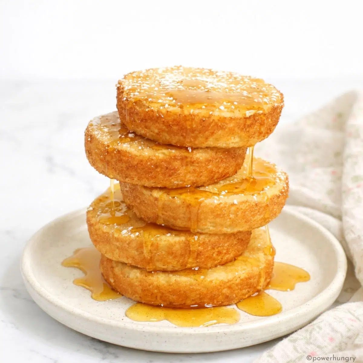 stack of vegan grain-free muffin tin pancakes on a plate