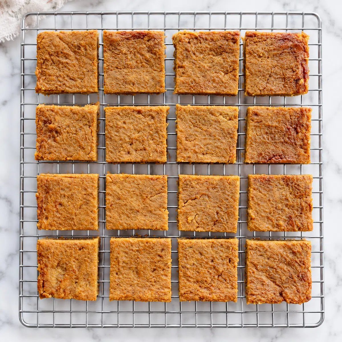 vegan pumpkin pie bars on a cooling rack