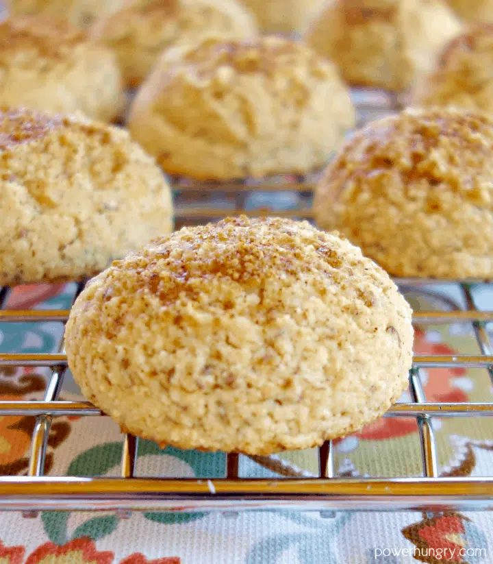 Vegan coconut flour snickerdoodles on a stainless steel cooling rack