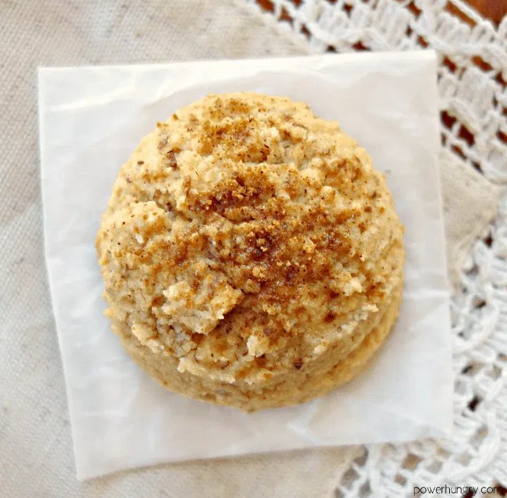 Vegan coconut flour snickerdoodle on a lace and linen napkin