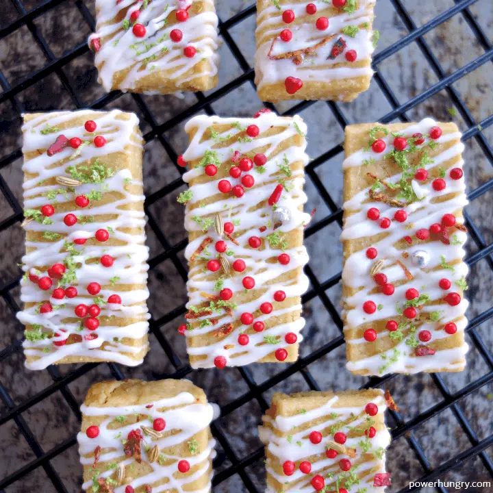 Coconut Lime Chickpea Flour Shortbread, shot from overhead on a black metal cooling rack