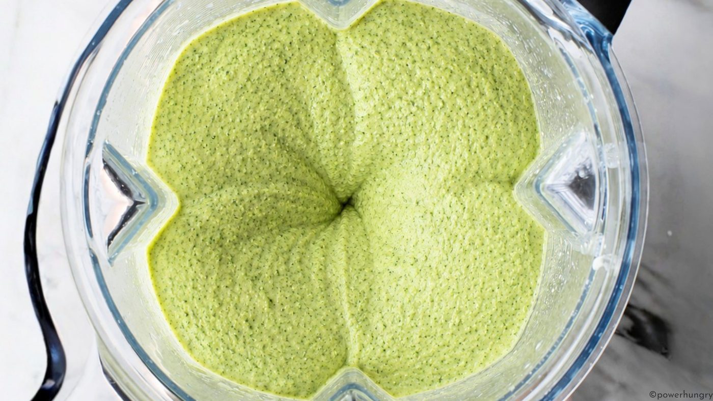 overhead shot of blender full of broccoli hummus