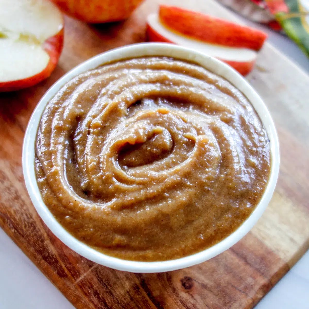 apple caramel dip in a small white bowl