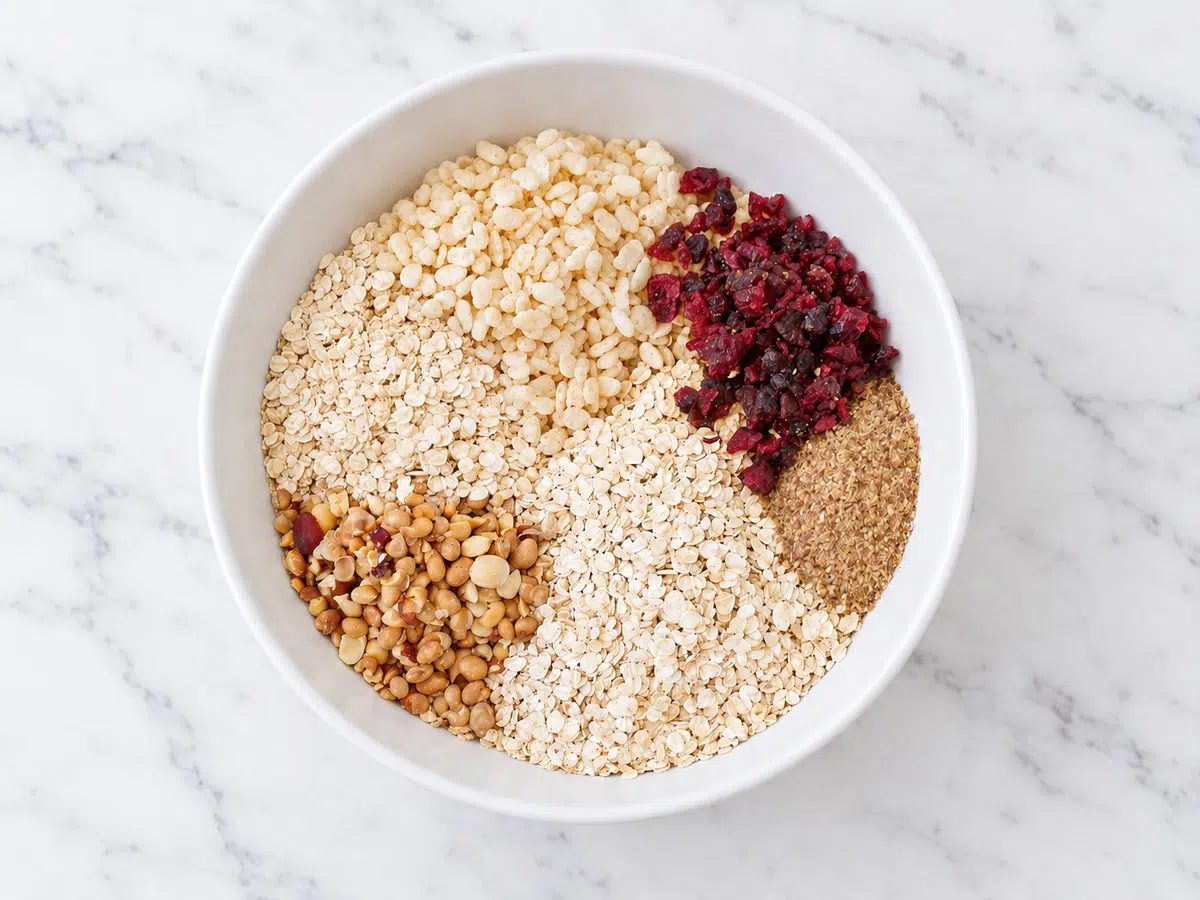 kitchen-made clif bars dry ingredients in white bowl