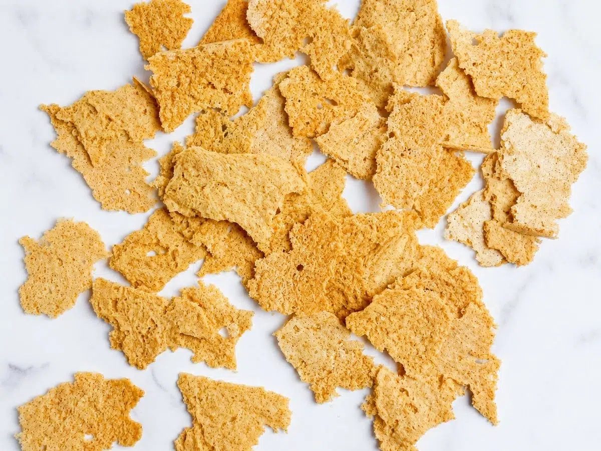 crispy rice chips on marble surface