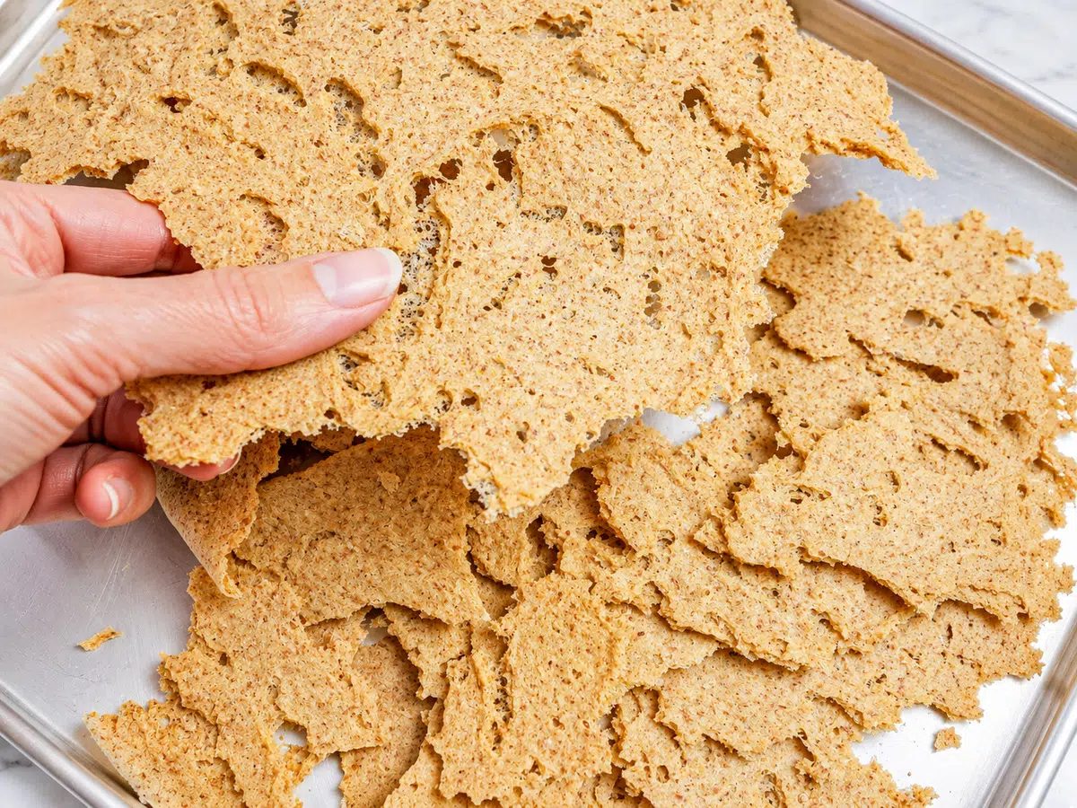 close-up of brown rice chips on baking sheet