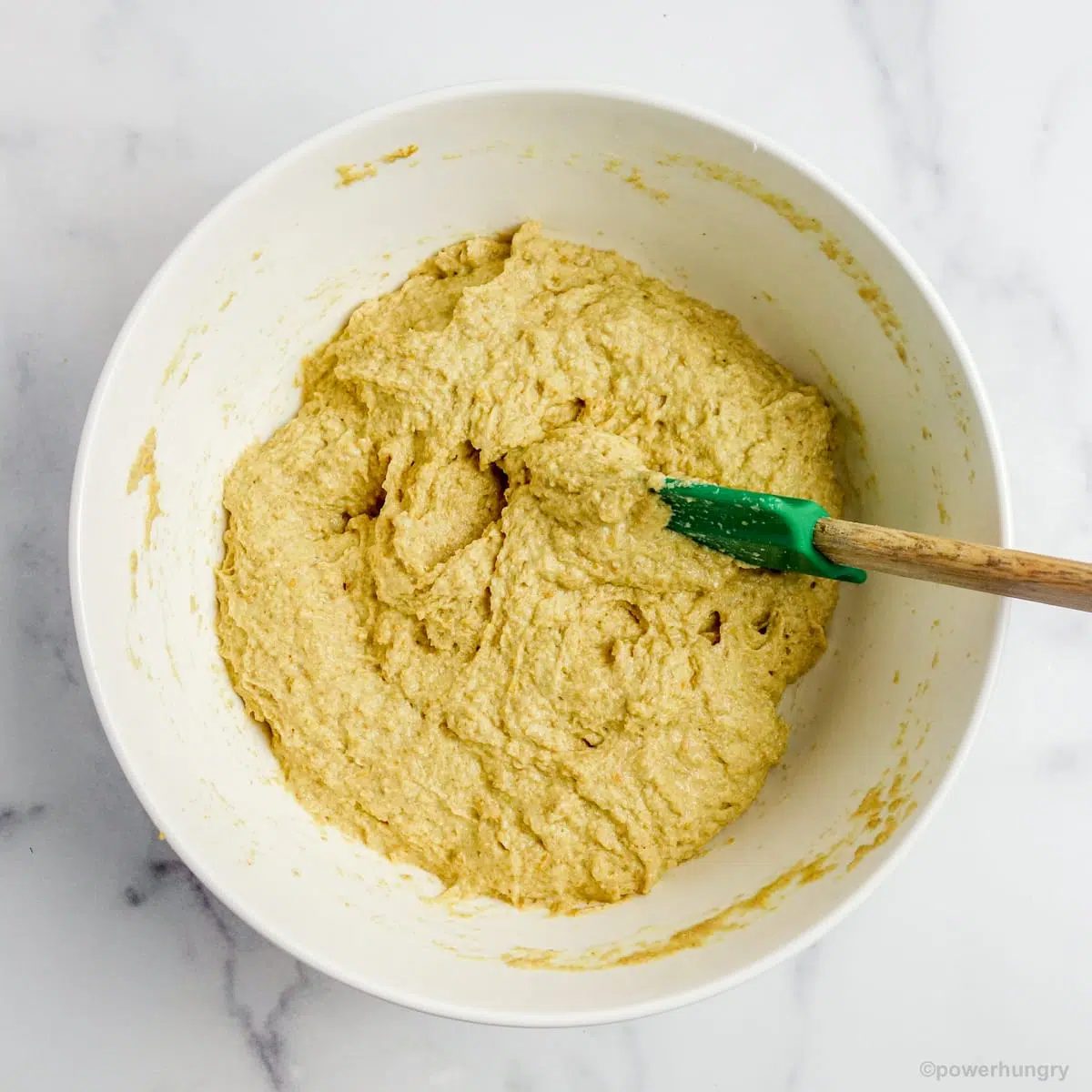 mixed dough, in a white bowl, for 2 ingredient flax rolls