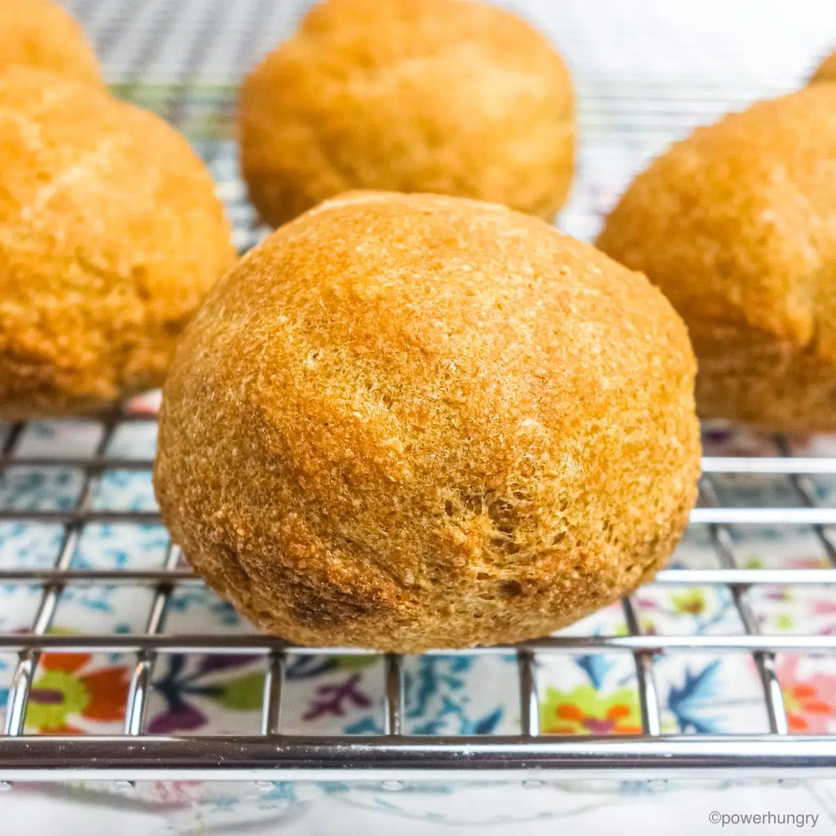 close up of flax rolls cooling on a cooling rack