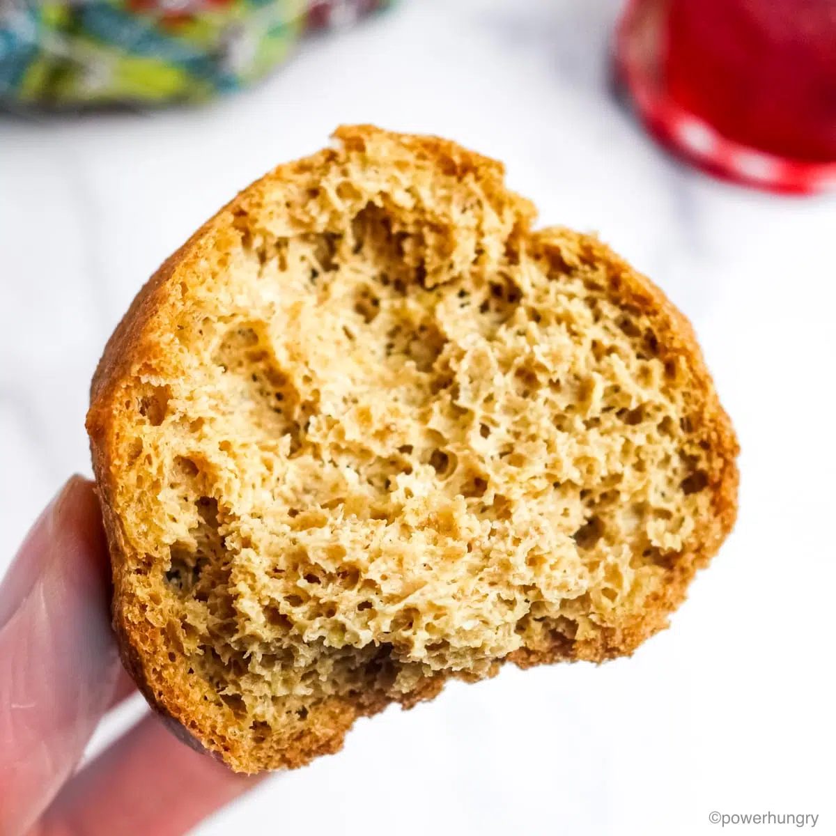 half of a 2 ingredient flax roll showing the fluffy interior