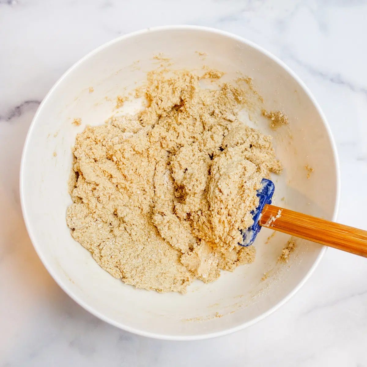 oat scone dough in a white bowl