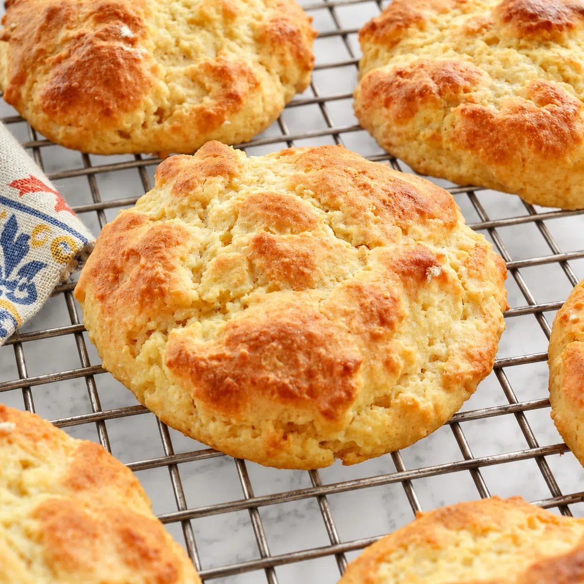 vegan almond flour biscuits on cooling rack, close-up