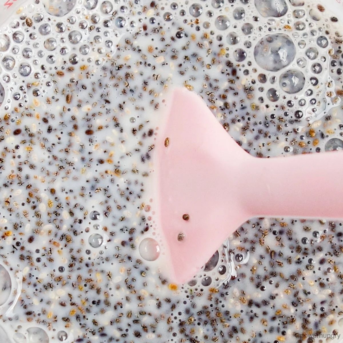 close-up of the mixing of fast chia seed pudding