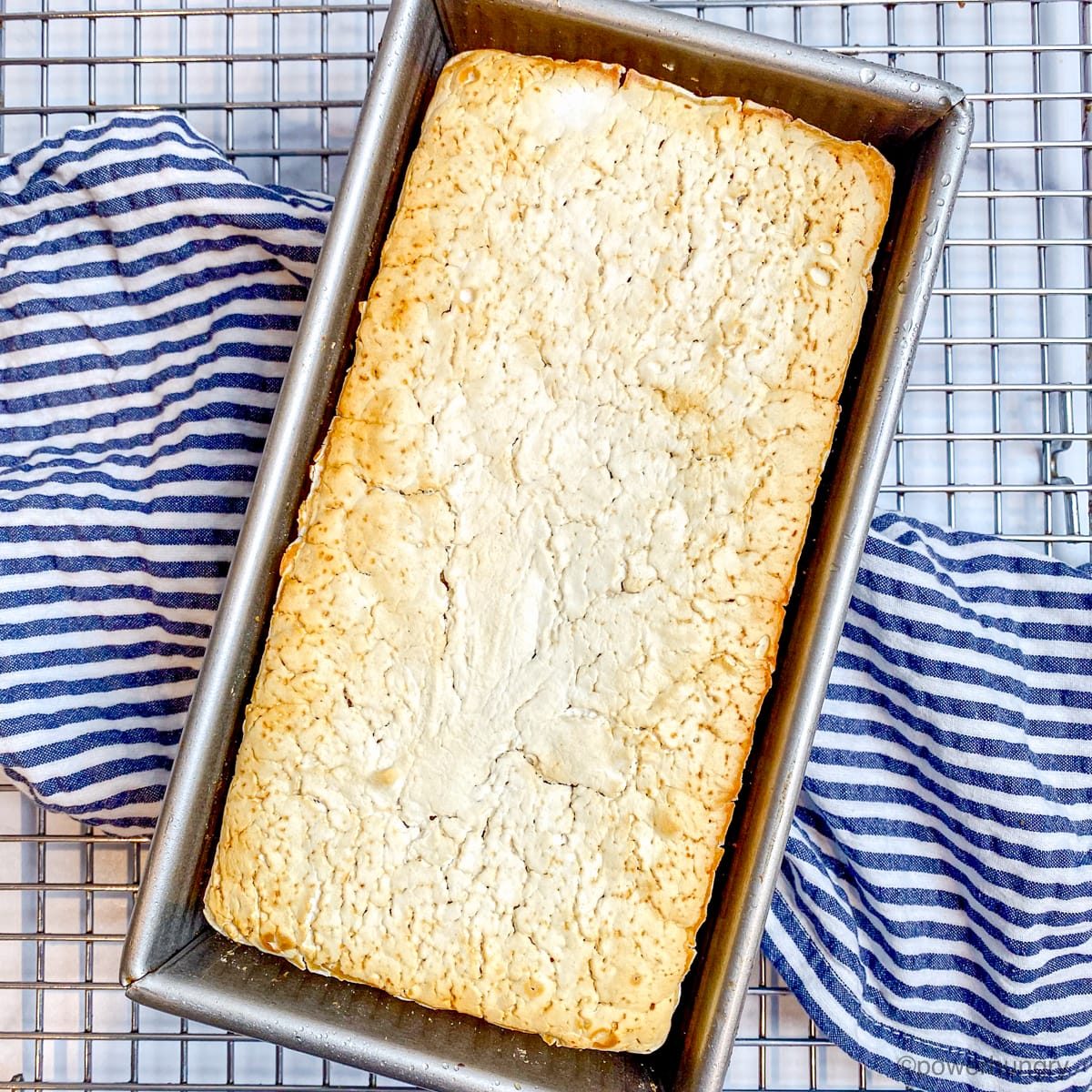 baked brown rice bread in a loaf pan