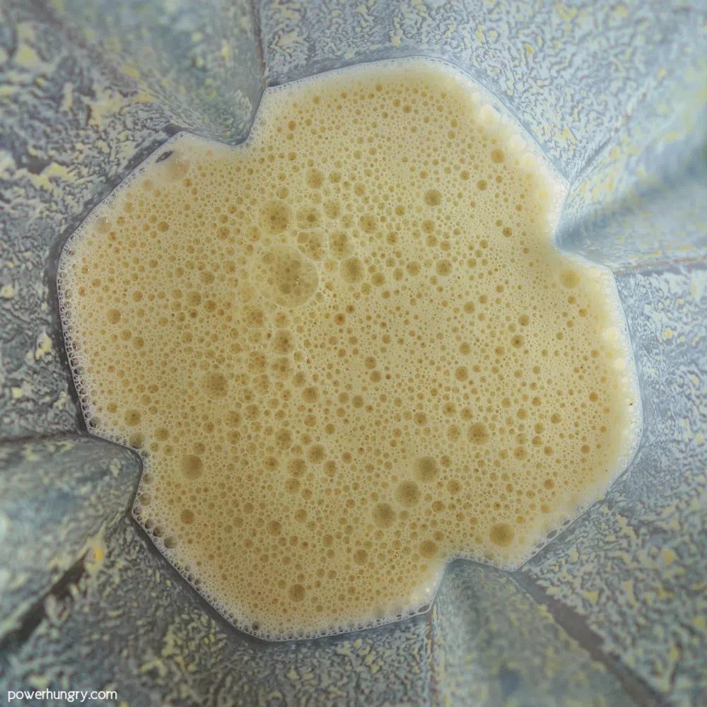 overhead shot of millet blended with water and vinegar