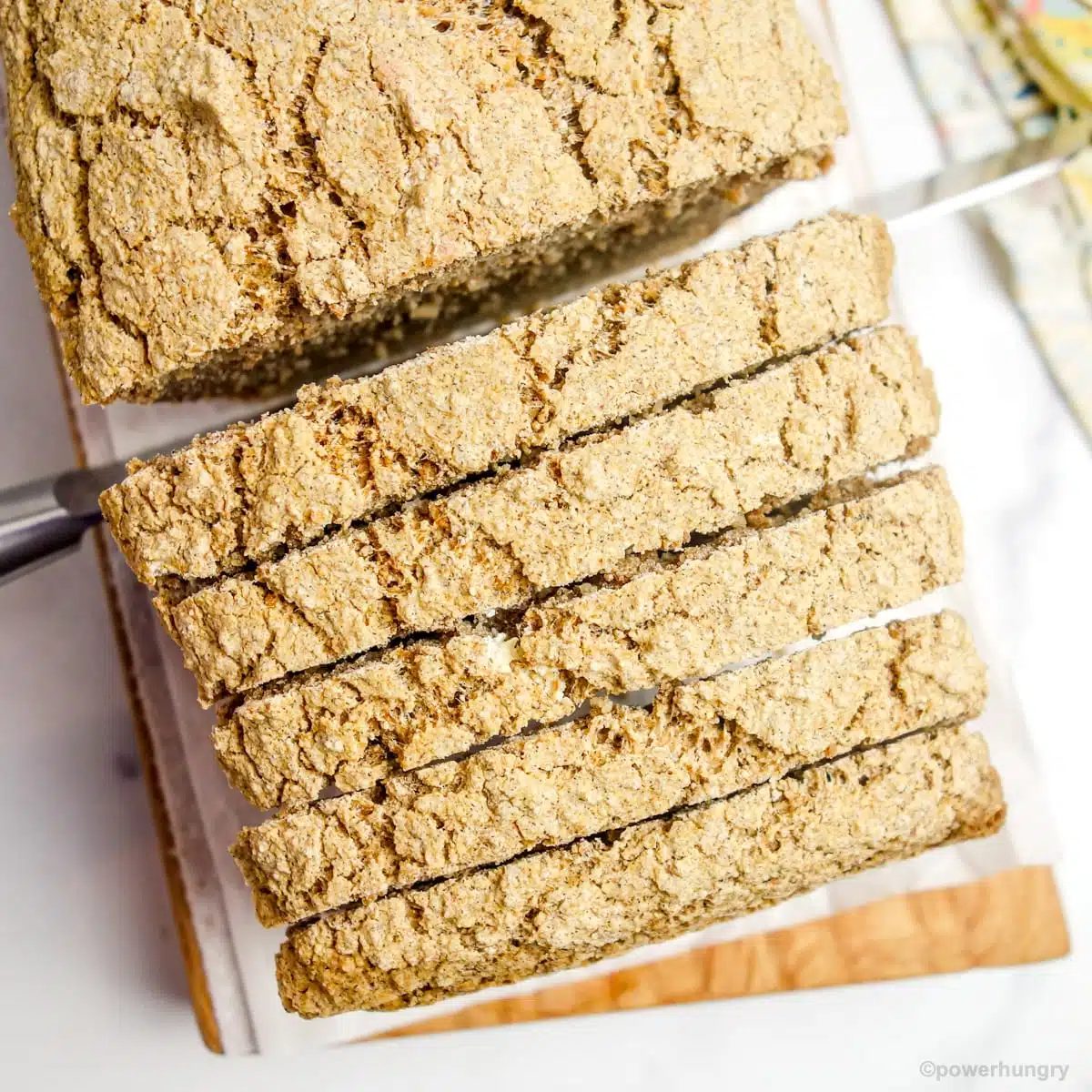 overhead shot of a loaf of straightforward gluten-free multigrain bread, sliced