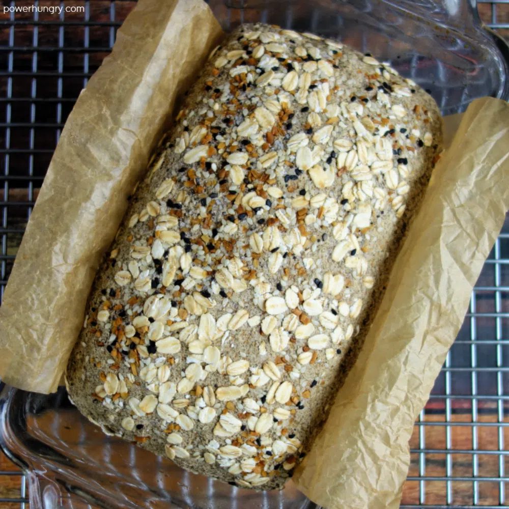 buckwheta bread in a baking pan, cooling on a wire cooling rack
