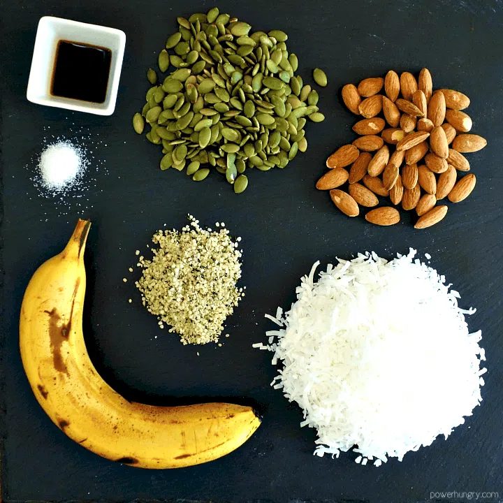 ingredients for grain-free banana granola laid out on a piece of slate