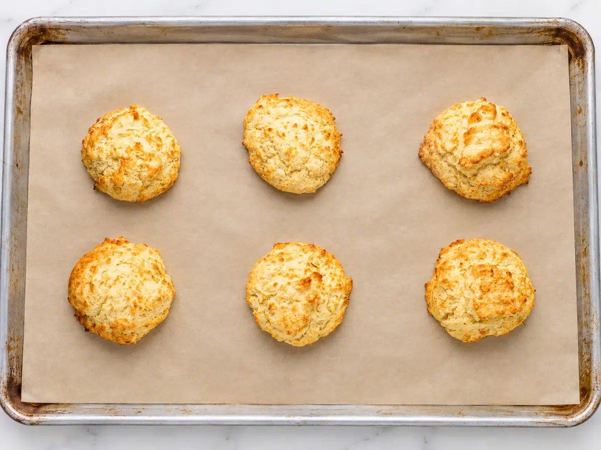 baked chickpea flour biscuits on a baking sheet