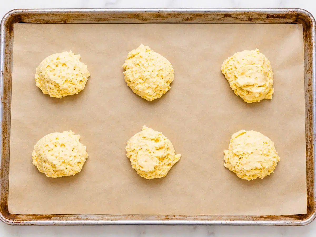 unbaked chickpea flour biscuits on baking sheet