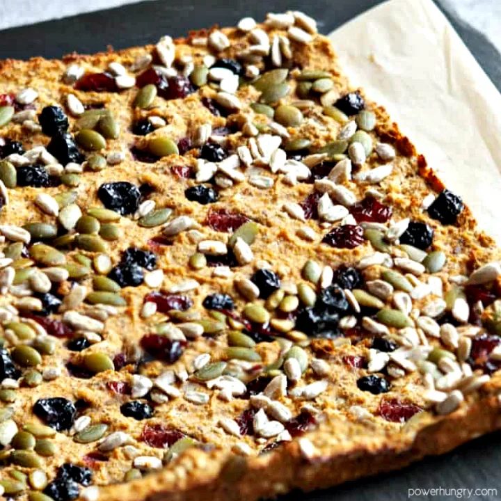 grai-free coconut flour breakfast bars, uncut, on a slate cutting board