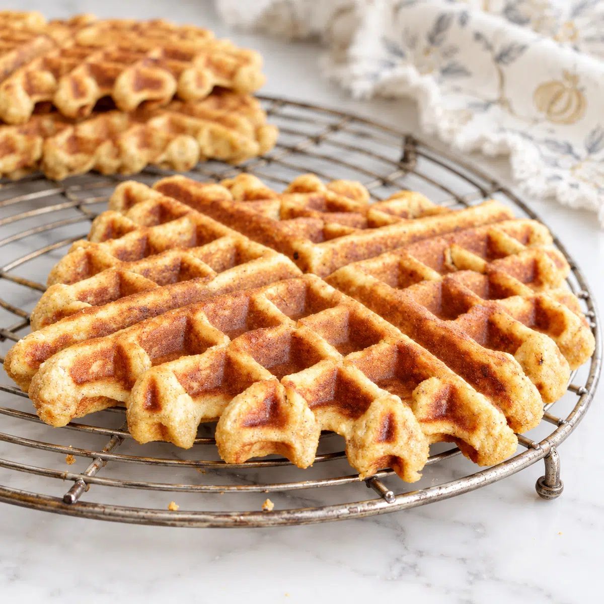 almond flour banana waffles on a cooling rack