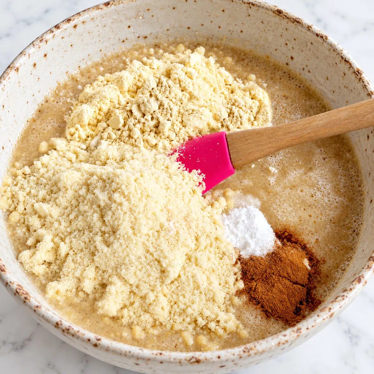 dry ingredients added to almond flour banana waffles batter