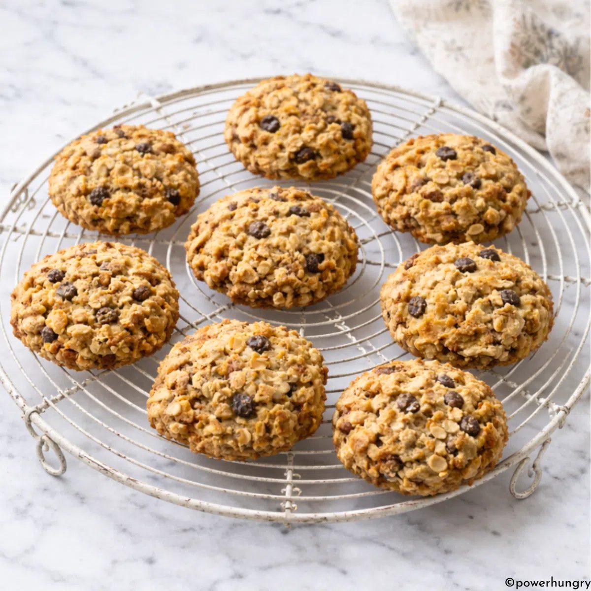 vegan carrot cake oat cookies on a cooling rack