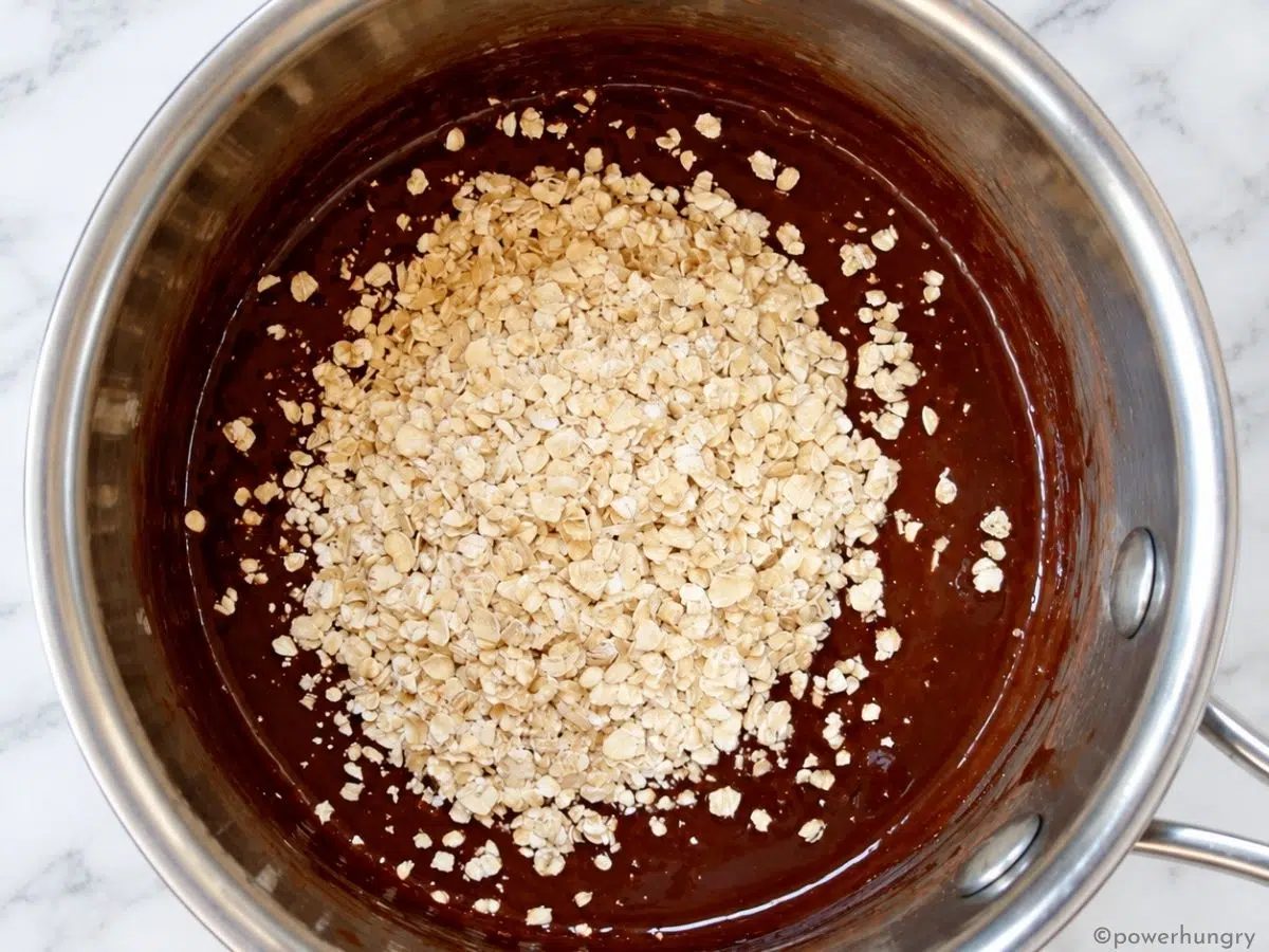 oats added to liquid base for chocolate oat banana cookies