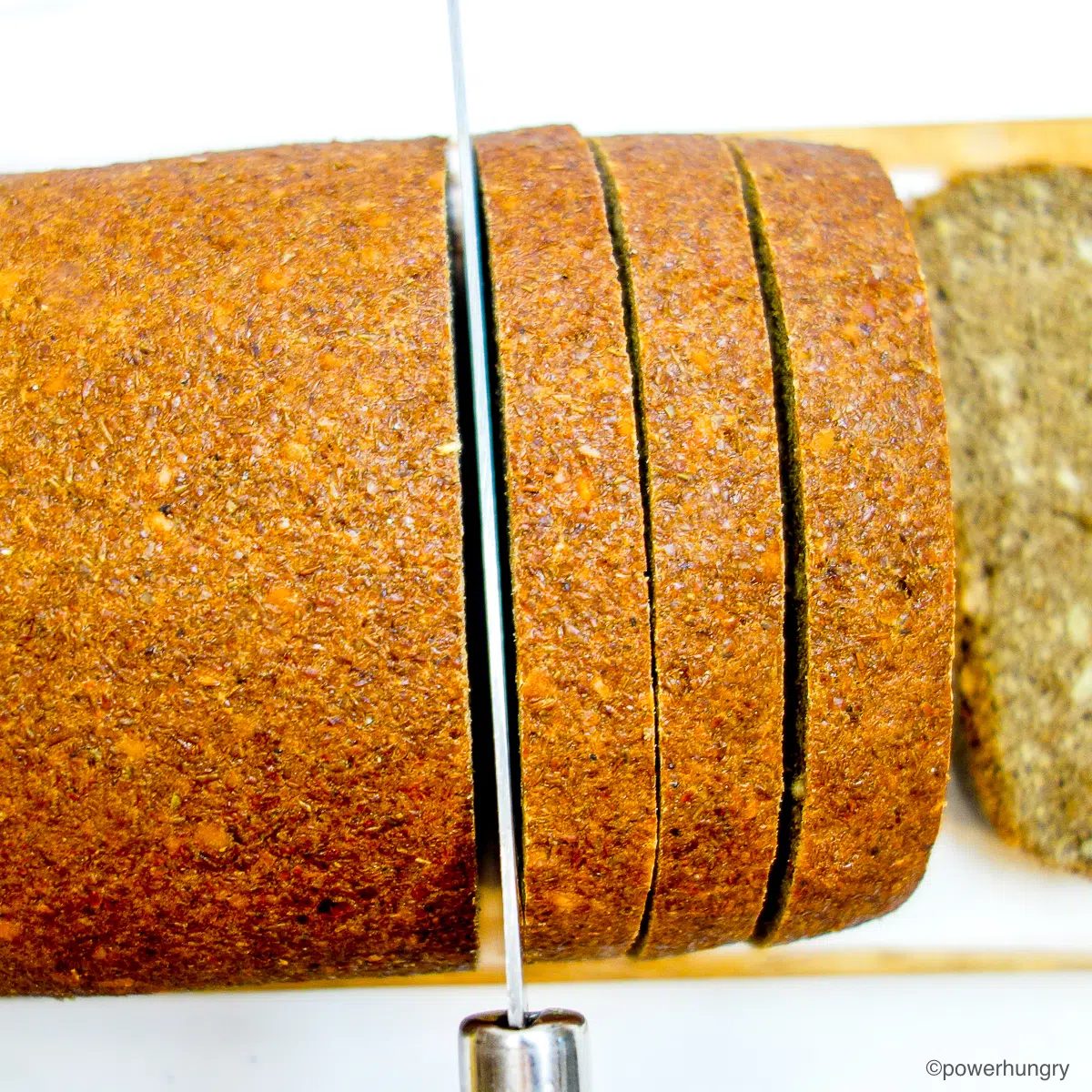 banana lentil bread, sliced, on a cutting board