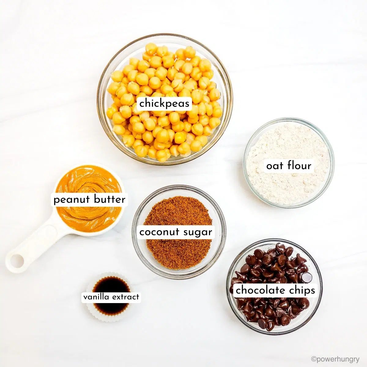 small bowls filled with ingredients for high protein chickpea cookie dough