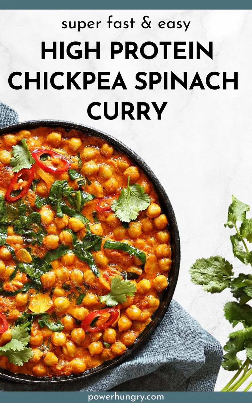 high protein chickpea spinach curry in a dark bowl